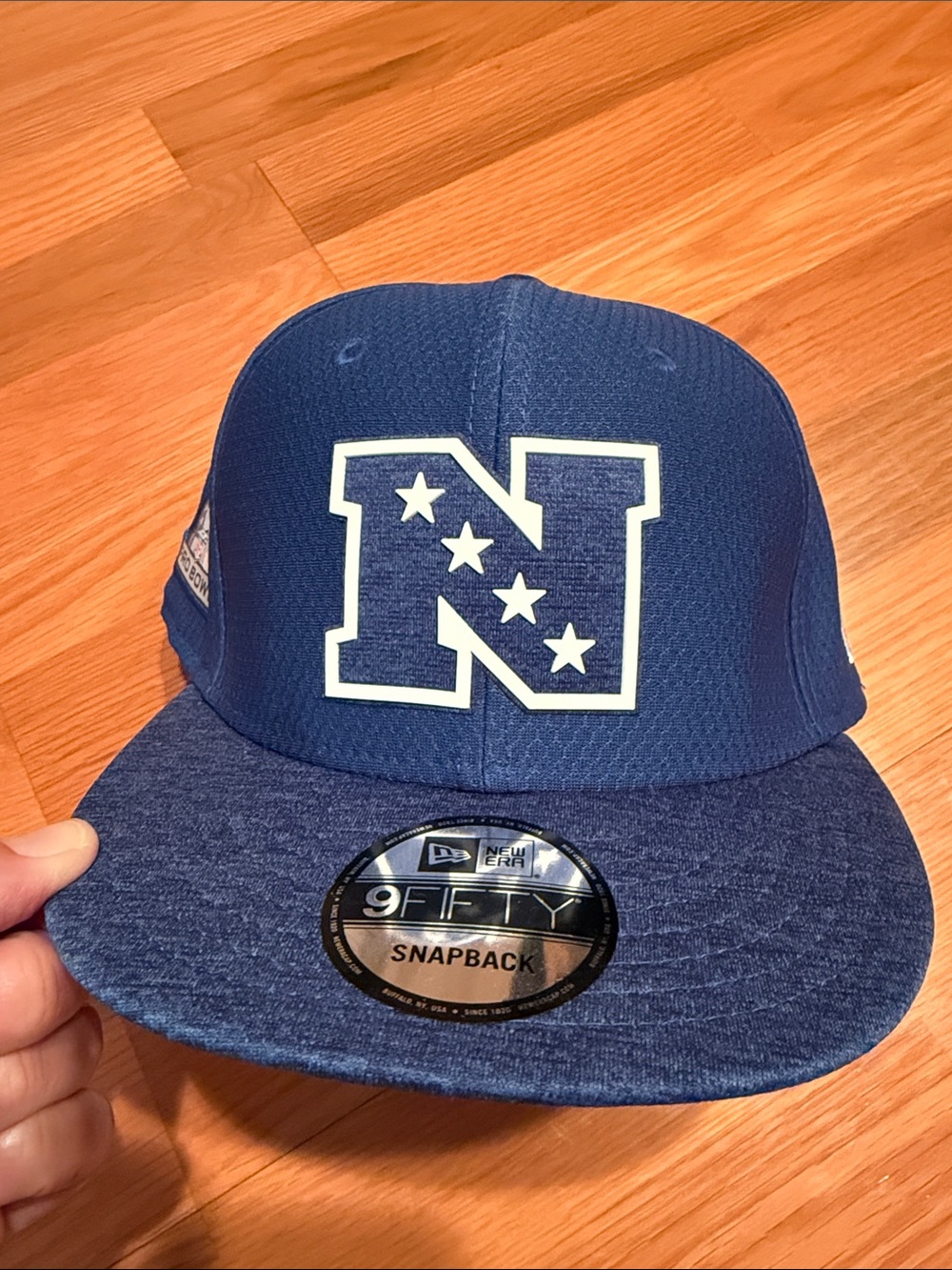 New Era Men’s Navy Snapback Hat with Embroidered 'N' Logo